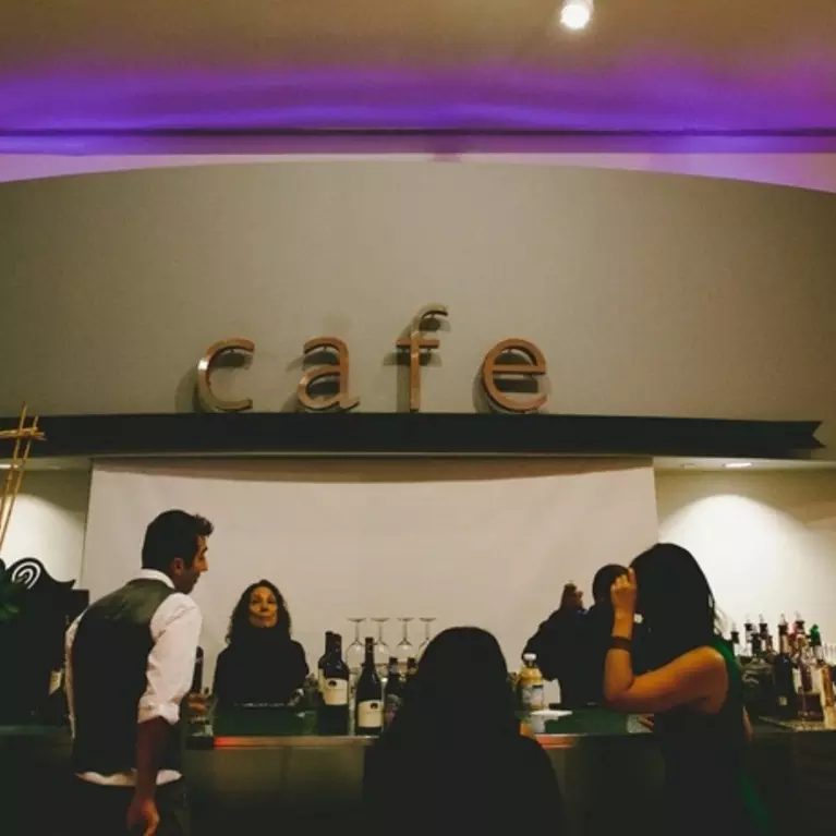 "Cafe" banner over bar