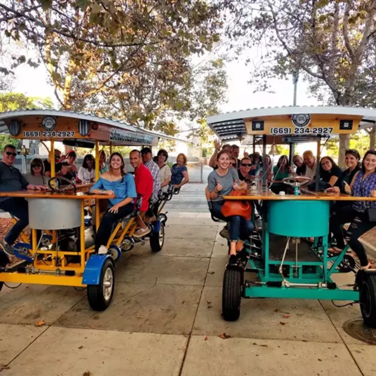 Friends enjoy San Jose Brew Bike, travelling from brewery to various businesses.