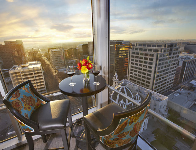 Chairs and a table over the city view