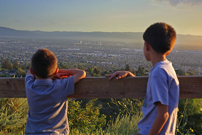 kids on a hiking trail overlooking the valley in Alum Rock Park