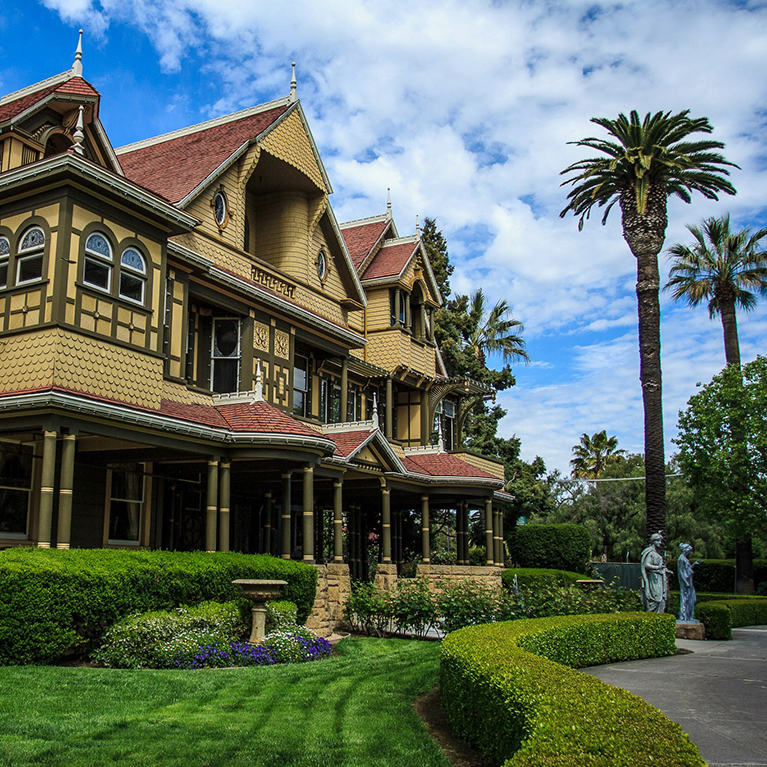 A view of the Winchester Mystery House from the beautifully manicured garden.