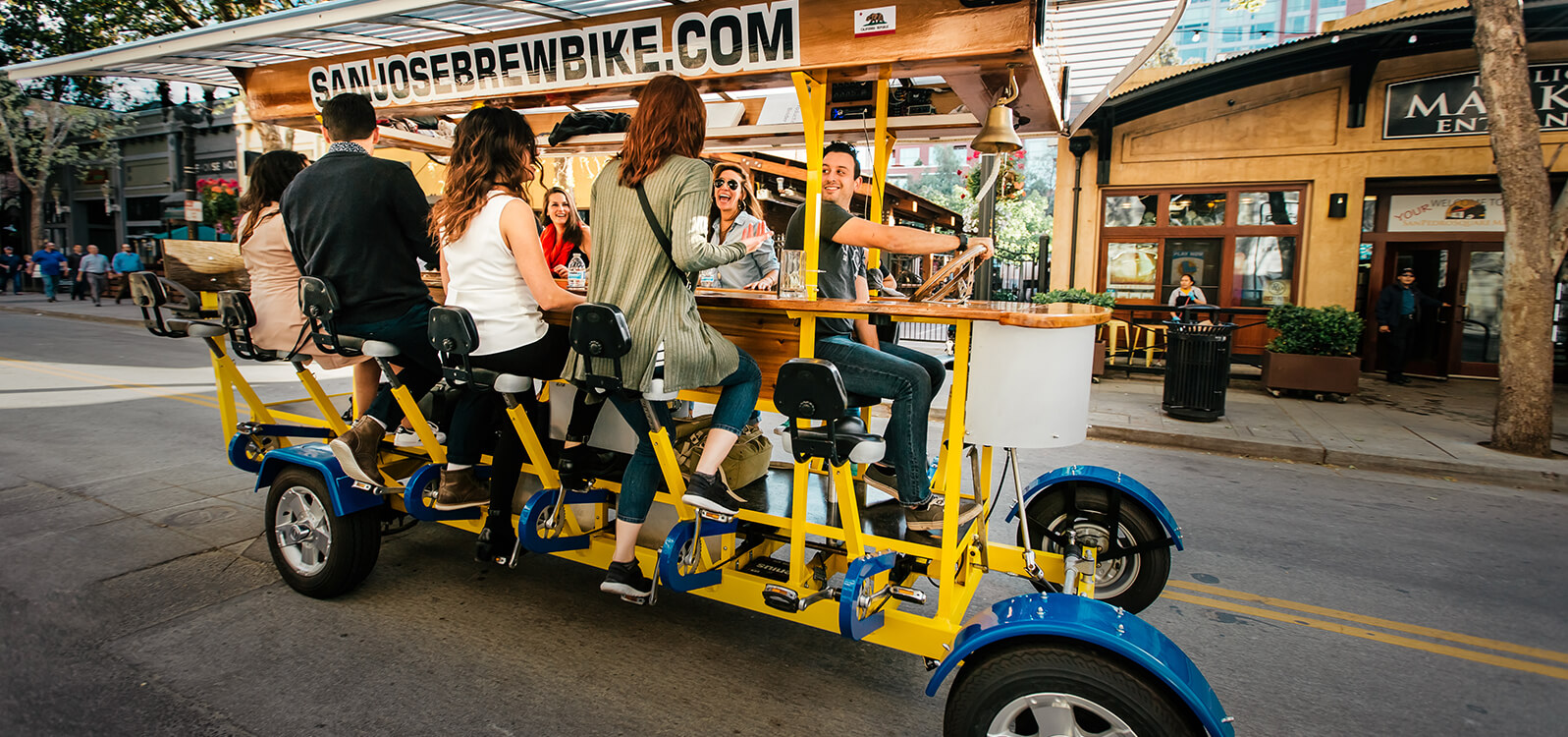 people on a brew bike tour