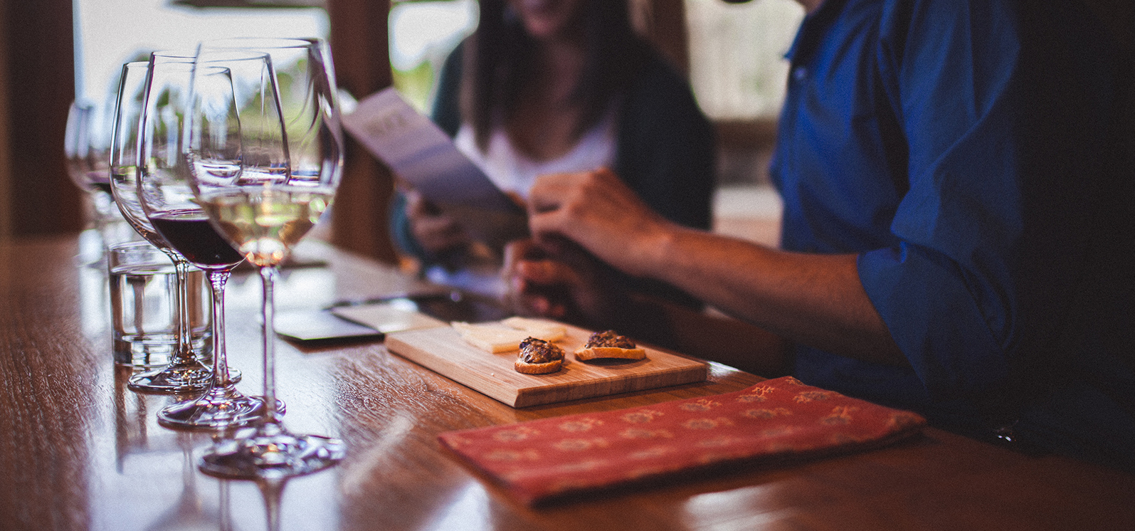 People Wine and Cheese Tasting in a tasting room 