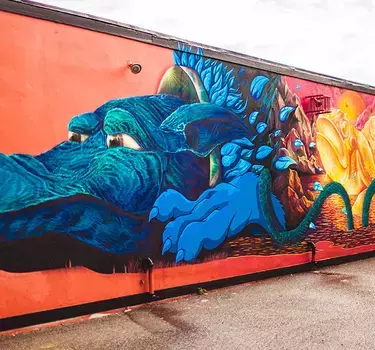 A beautiful mural title "Little Moment", Some say it's a wolf, a dog and even a dragon!
