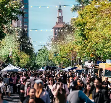 South 1st Street crowded with people attending the SoFA Street Fair