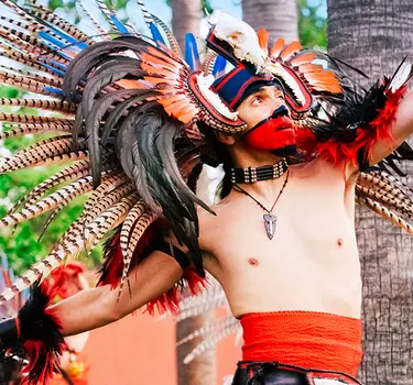 Aztec dancer performing at the Mexican Heritage Plaza