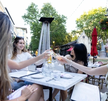 A group enjoying a night out in Santana Row in San Jose, California