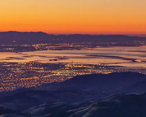 Silicon Valley sunset from the rolling east foot hills looking down on the Valley and city lights