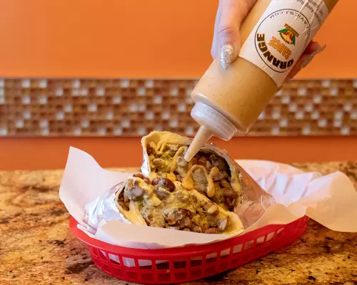 la vic's burrito with orange sauce