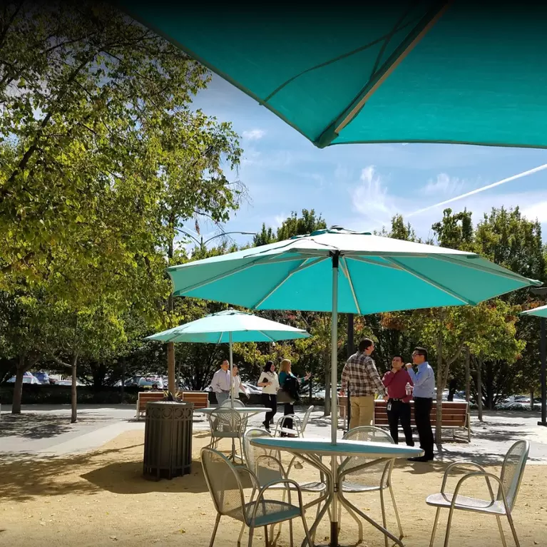 patio with umbrella tables