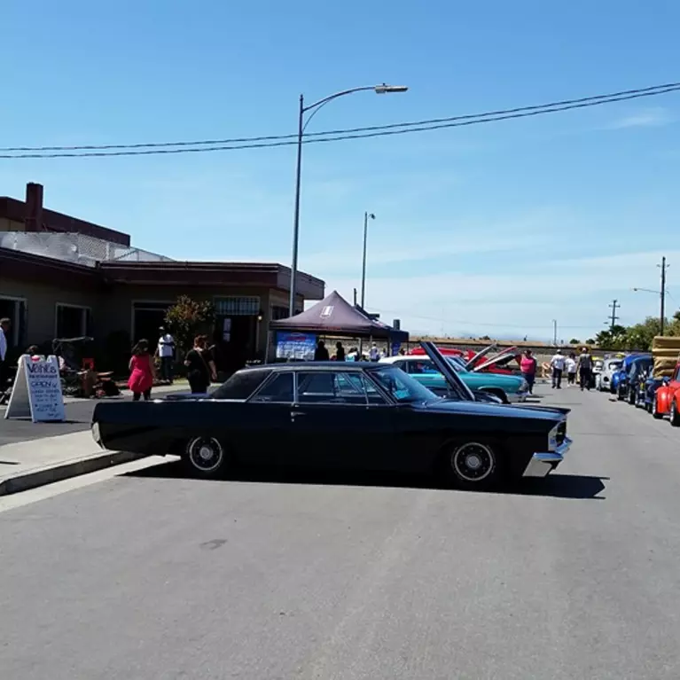 Exterior of Vahls with a classic car