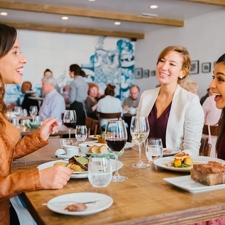 People enjoying dinner at Adega Restaurant in Little Portugal in San Jose