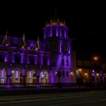 San Jose Civic at night lit up in purple lights for the Golden State Valkyries.